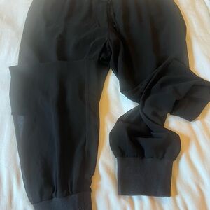 Sheer black pants bebe, size S